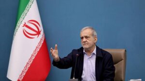 Iranian and British flags displayed against a backdrop representing rising geopolitical tensions.