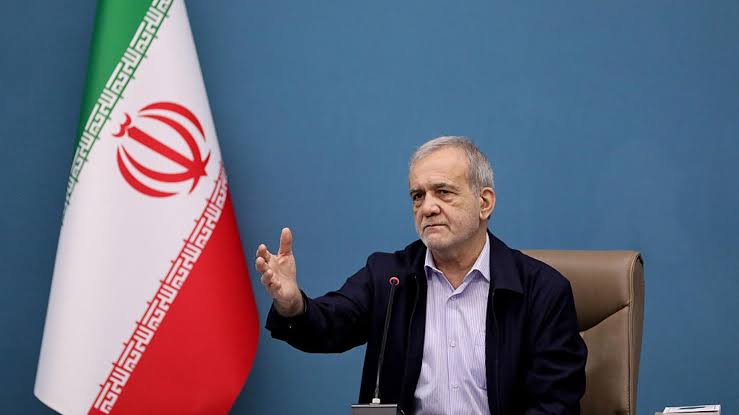 Iranian and British flags displayed against a backdrop representing rising geopolitical tensions.