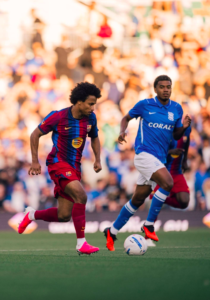FC Barcelona and Birmingham players compete during an exciting 2-2 pre-season friendly match.